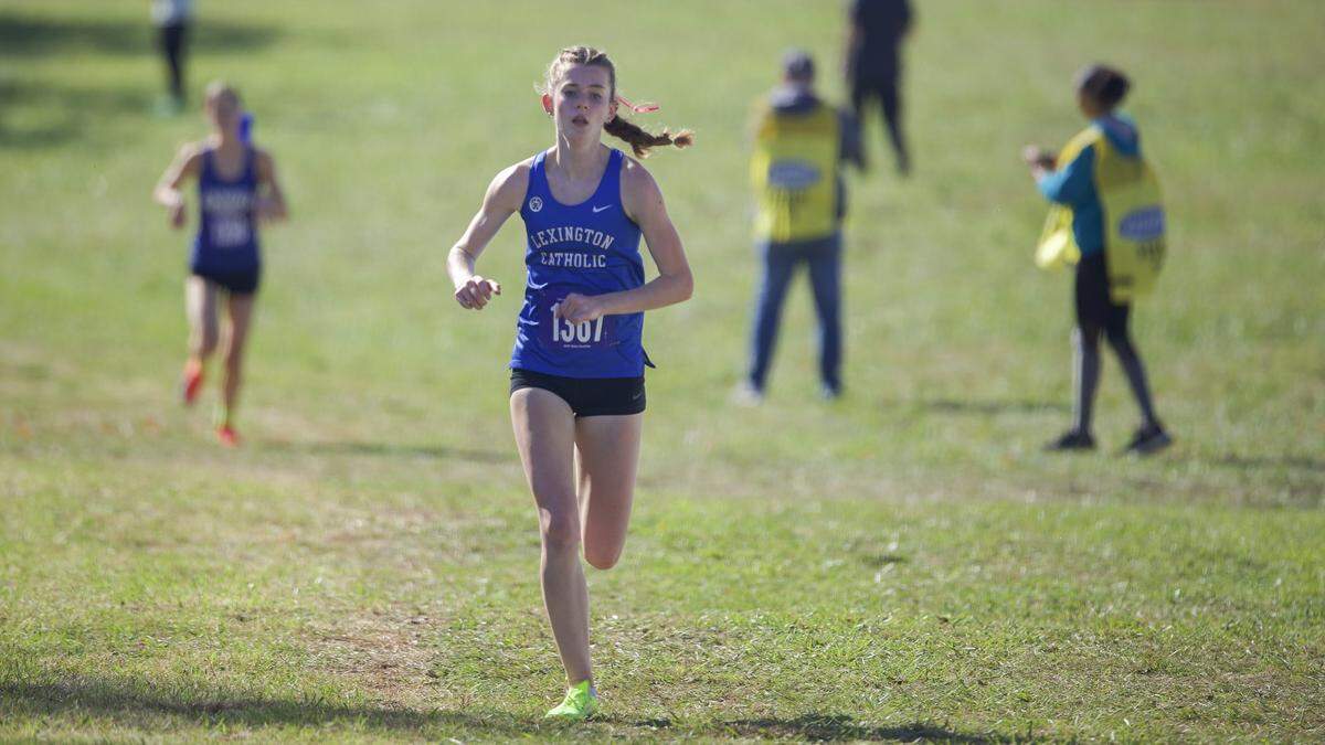 Lexington Catholic's Abigail Turner near the finish line during the 2025 KHSAA Class 2A State Cross Country Meet at the Kentucky Horse Park in Lexington, Ky., on Saturday, Nov. 1, 2025. Turner won third place. 