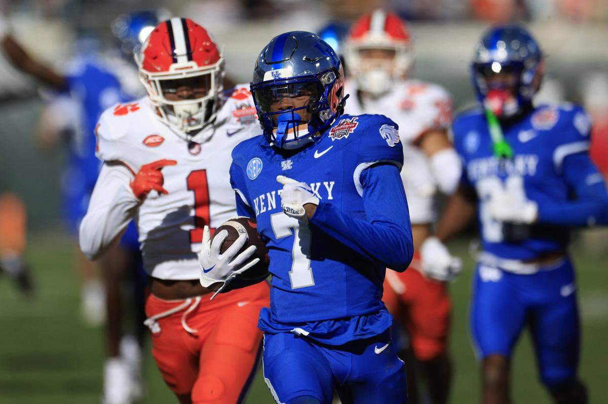 Barion Brown (7) set the Kentucky school record for career kickoff return touchdowns when he took the opening kick of the second half 100 yards vs. Clemson in UK’s 38-35 loss to the Tigers in last season’s TaxSlayer Gator Bowl.