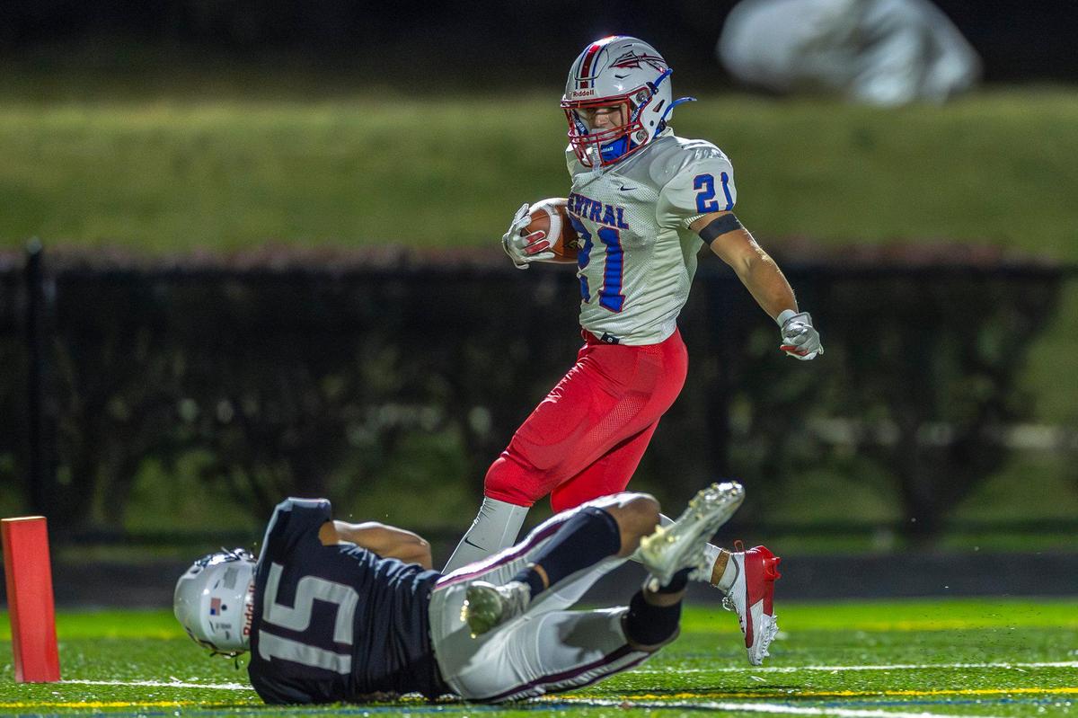 Madison Central’s Bryant Mathis (21) scores one of his four touchdowns during Friday’s game against Tates Creek.
