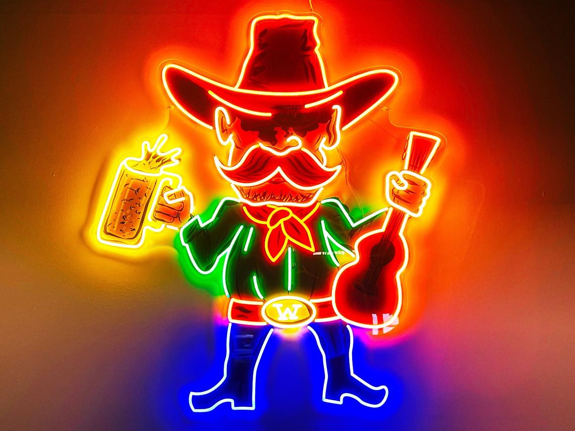 “Willie,” the mascot of 2 Fisted Willie’s, a new bar open on Woodland Avenue in Lexington. In some logos, the item in Willie’s right hand will change with the seasons: A football for football season, a basketball for basketball season, etc.