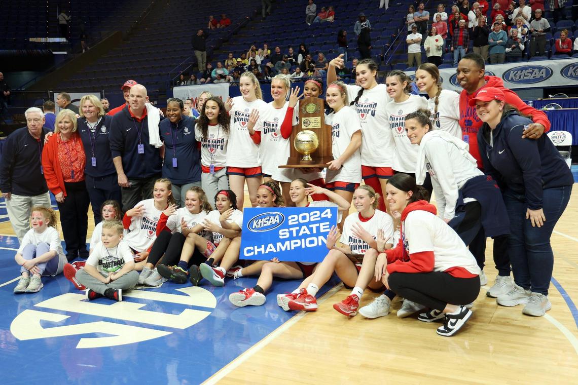 Sacred Heart team members celebrate after the championship game of the Mingua Beef Jerky Girls’ Sweet 16 tournament at Rupp Arena. The Valkyries won 60-49.