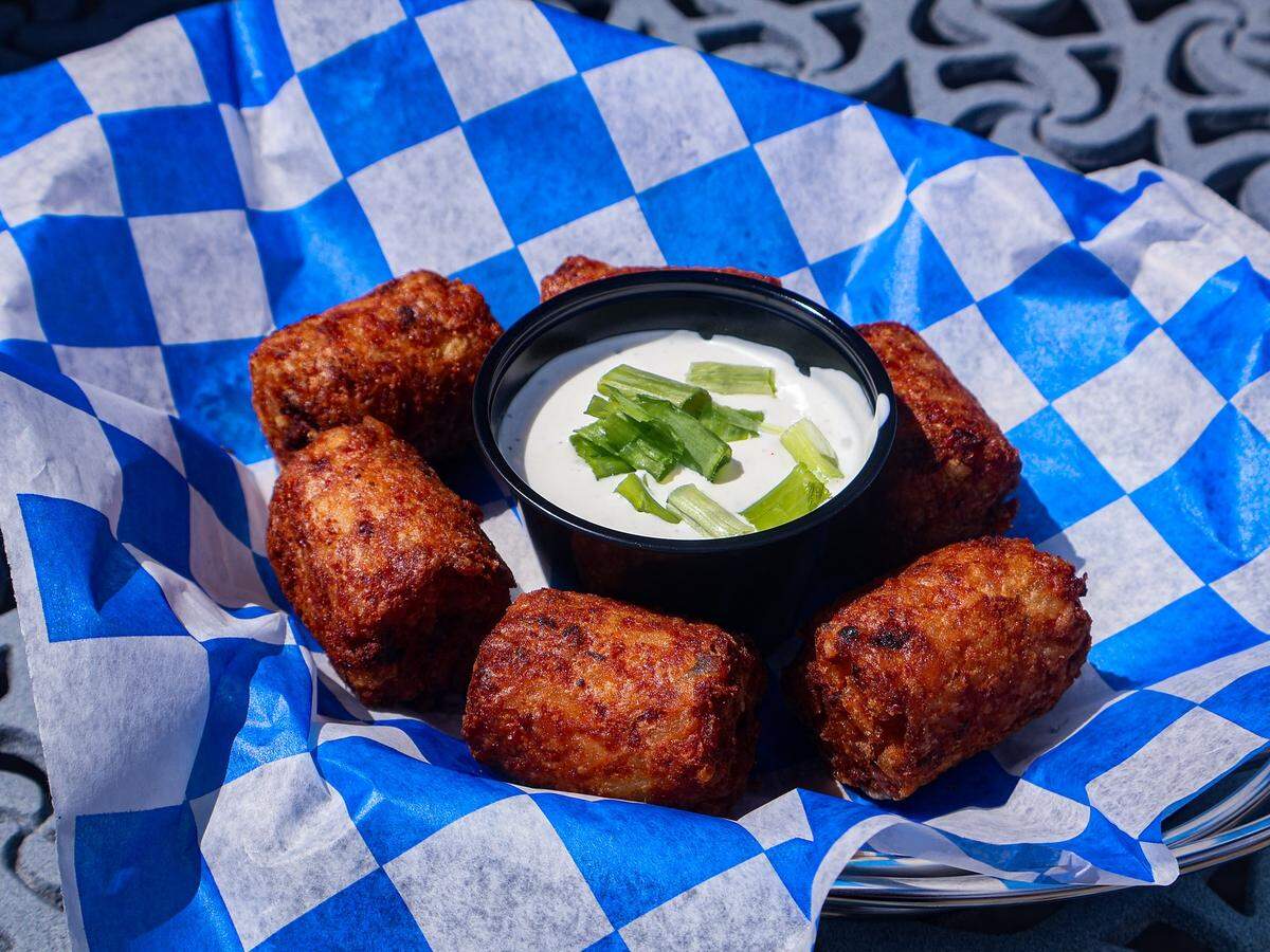 Tater Kegs appetizer ($12.50), oversized Tater Tots filled with bacon, cheese, sour cream, and chives from KSBar & Grille.