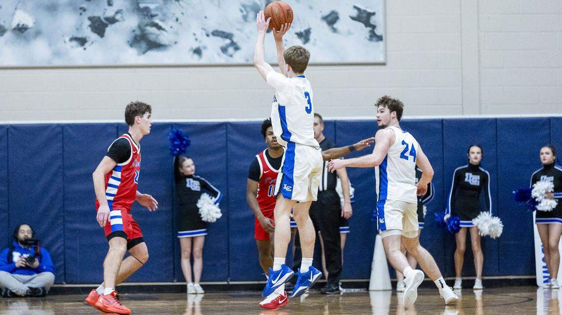Lexington Catholic's Ben Warren (3) makes a game-tying three-pointer during fourth quarter of the Knight’s 60-56 win over Madison Central on Monday at Lexington Catholic High School.