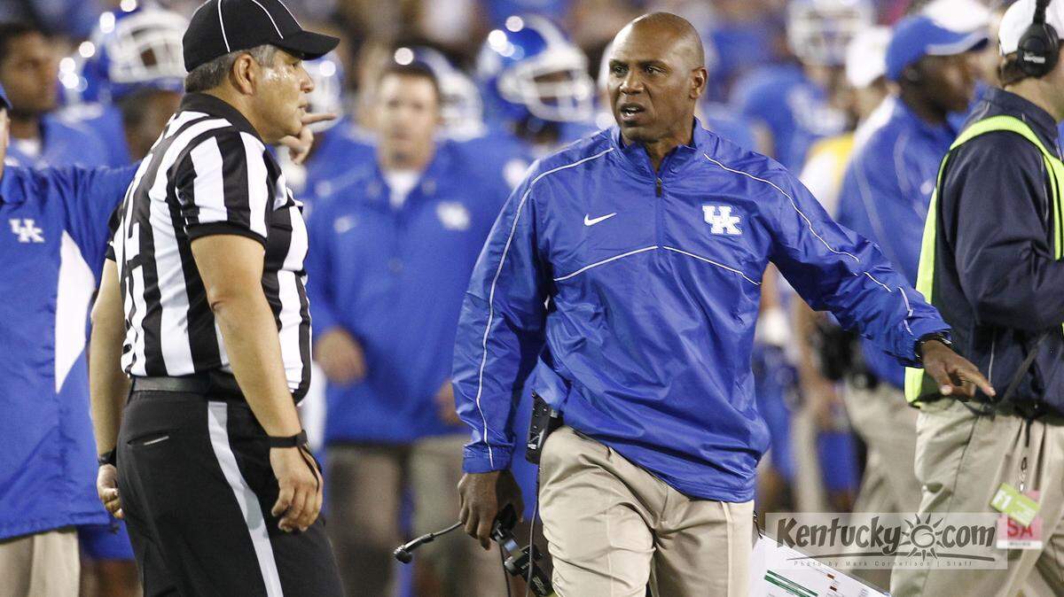 Kentucky Wildcats head coach Joker Phillips argued a call with the officials as UK defeatedKent State 47-14   on Saturday September 8, 2012 in Lexington, Ky.  Photo by Mark Cornelison | Staff