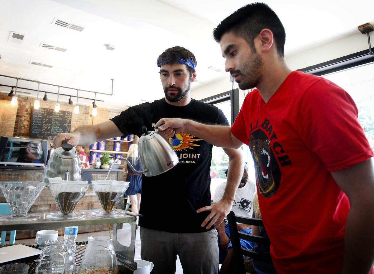 A Cup of Common Wealth owners Chris Ortiz, left, and Salvador Sanchez in 2013.