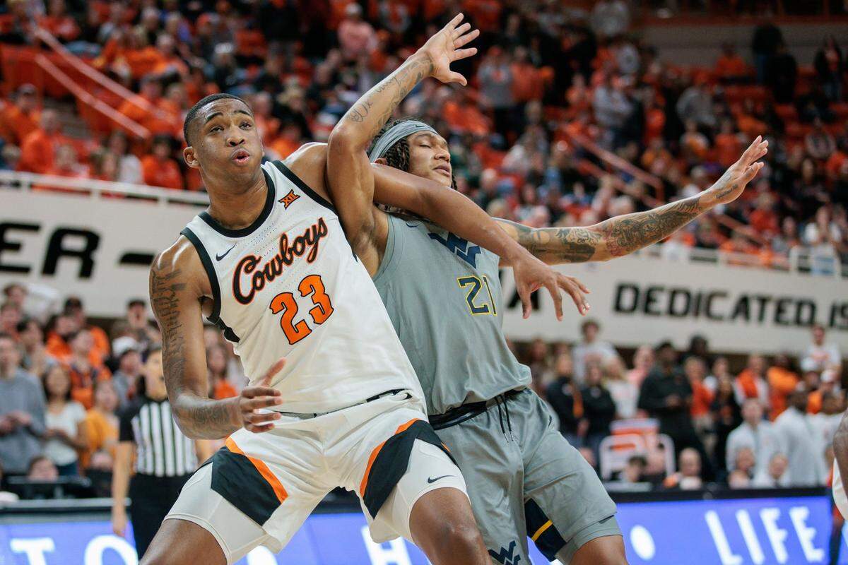 Brandon Garrison, left, was a McDonald’s All-American last year before playing his freshman season at Oklahoma State.