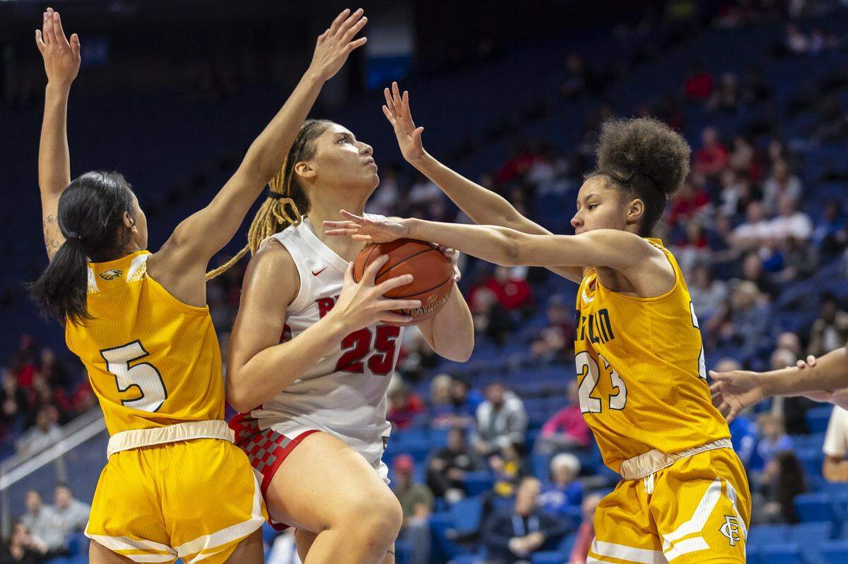 Butler’s Mariah Knight (25) drives between Franklin County’s Leia Hogan (5) and Logan Kennedy (23) on Friday. Knight finished with 12 points, 10 rebounds, three assists and three blocks.