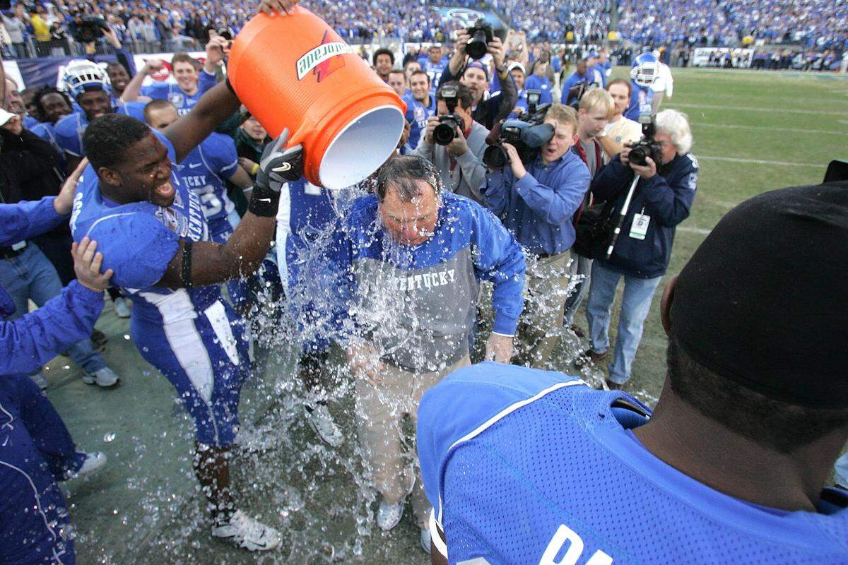 Kentucky Coach Rich Brooks got a Gatorade bath after UK defeated Clemson 28-20 in the 2006 Music City Bowl.
