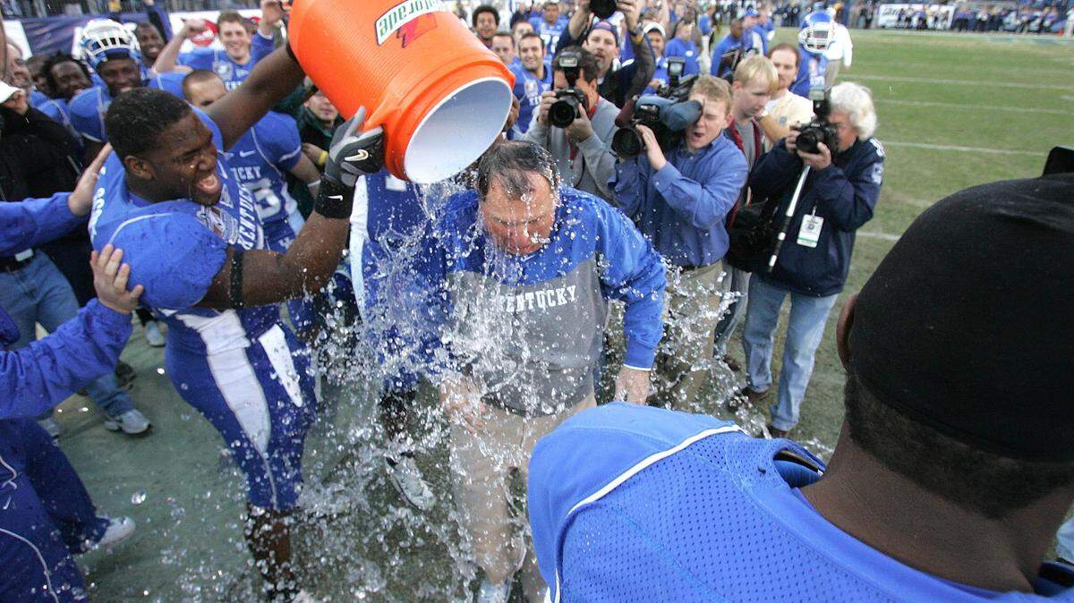 Rich Brooks led Kentucky football to four consecutive bowl games after leading the program back from NCAA probation.