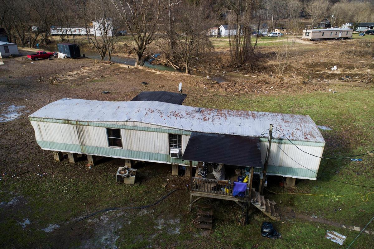 The home of Loranda Hayton sits damaged along Smith Bottom Loop in Sidney, Ky., Thursday, Jan. 13, 2022. Hayton was home when Big Creek rose nearly 30 feet in minutes on Jan. 1 causing damages to houses, trailers and vehicles in the valley.