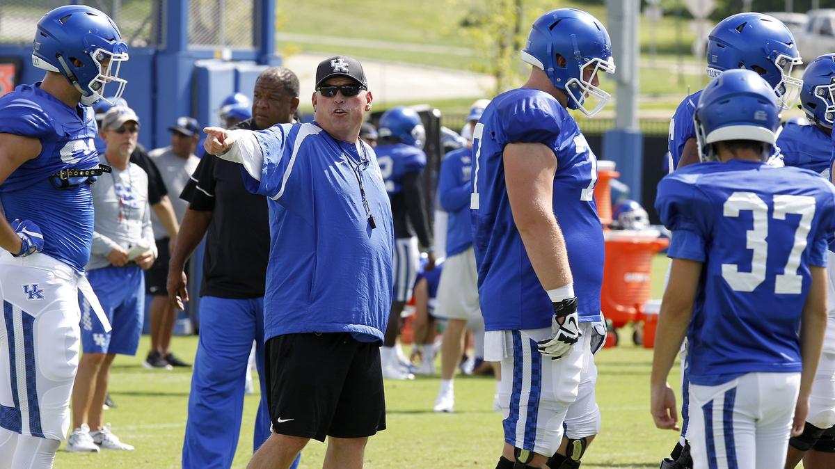 Despite battling a serious, undisclosed illness that has required multiple chemotherapy treatments, offensive line coach John Schlarman has not missed a day of practice, Coach Mark Stoops said. “That’s pretty inspirational to me, and I would assume to the players as well.”