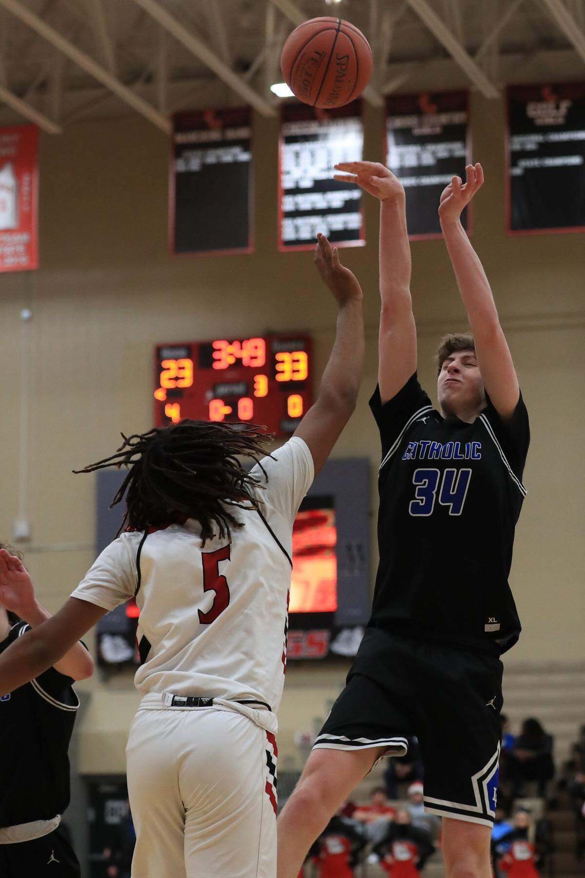 Seven-foot forward Reece Potter (34) is among the top players in the 11th Region. Lexington Catholic will lean on the junior as it vies for a region title in March.