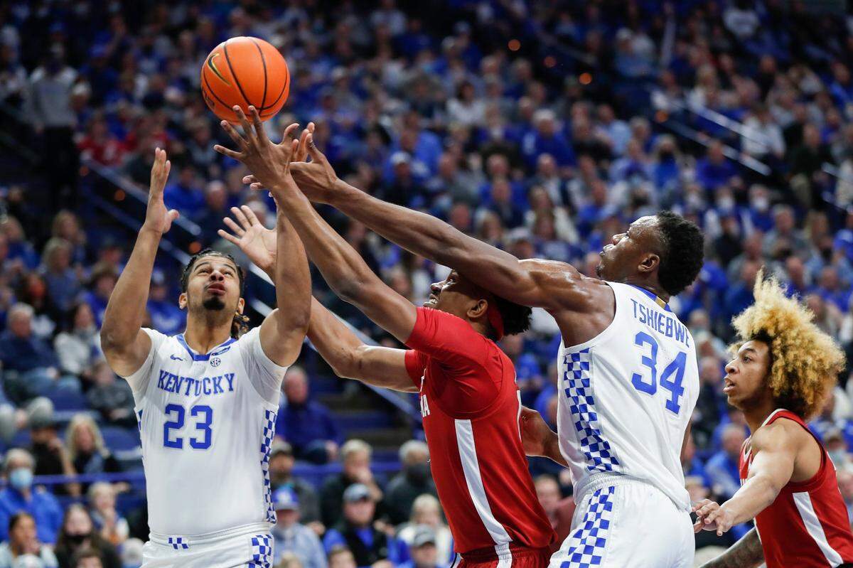 Former Kentucky teammates Bryce Hopkins (23) and Oscar Tshiebwe (34) are the stars for opposing teams when UK faces Hopkins’ current team, Providence, in the NCAA Tournament round of 64 Friday night.