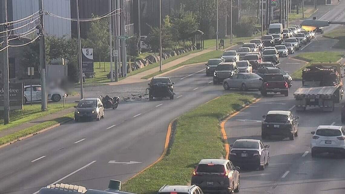 Major road in Lexington shut down after wreck and large fluid spill