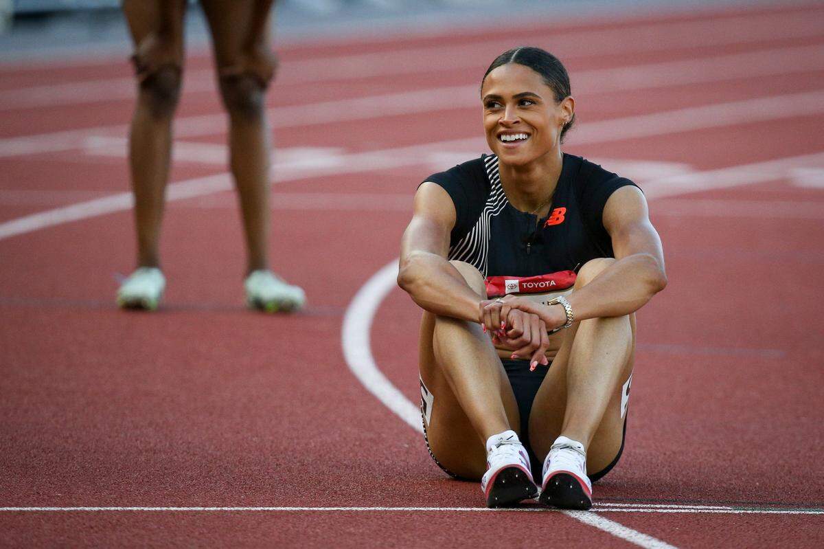 Sydney McLaughlin-Levrone rests after winning the women's 400 meters on day three of the USA Outdoor Track and Field Championships at Hayward Field in Eugene Saturday, July 8, 2023.