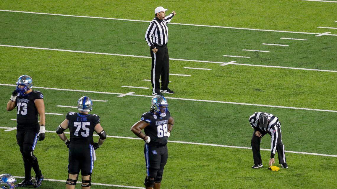 Referee Daniel Gautreaux signaled one of the 14 penalties that Kentucky incurred in what became a 38-21 loss to Missouri two weekends ago.