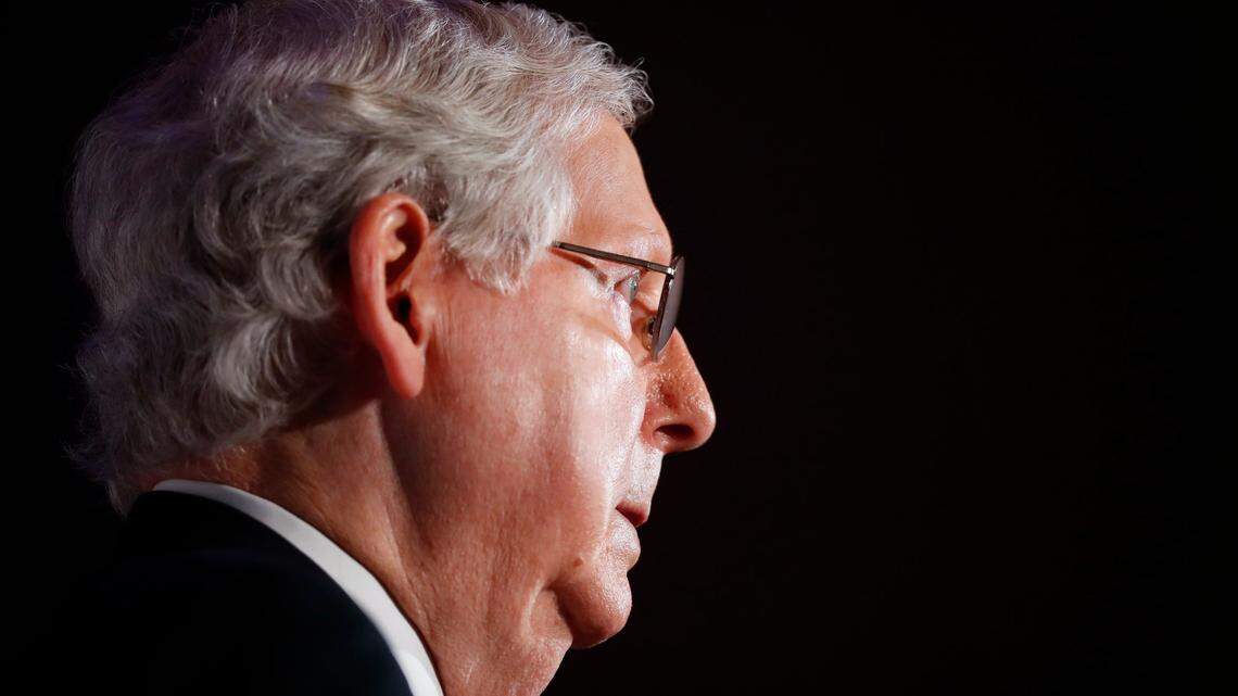 Republican Senate Majority Leader Mitch McConnell, standing with his wife Elaine Chao, gives remarks after winning reelection over Democratic challenger Amy McGrath at the Omni Hotel in Louisville, Ky., Tuesday, Nov. 3, 2020.