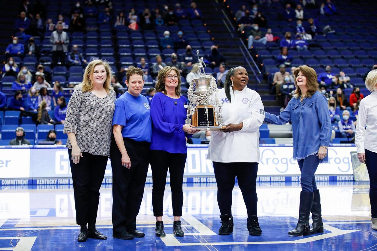 The Kentucky women’s basketball team from 1982 is honored during Sunday’s game against Mississippi.