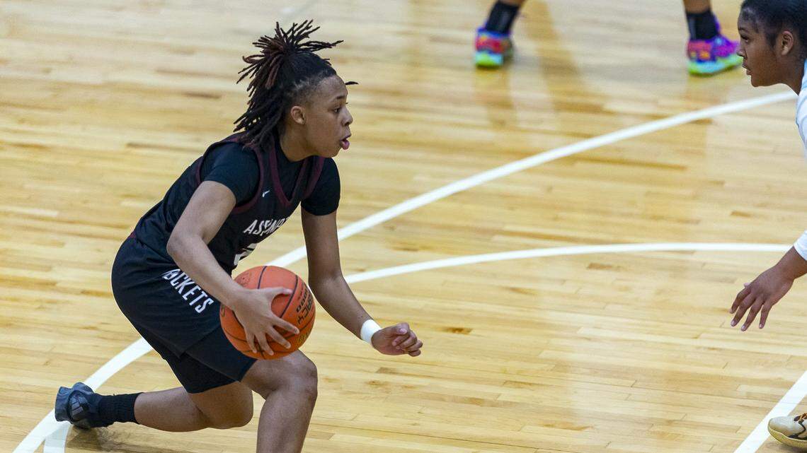 Assumption's Ashlinn James (31) drives the ball against Danville Christian's Amauri Blackford (24) during their game at Danville Christian Academy on Jan. 16. James is the 2025 Herald-Leader preseason player of the year.