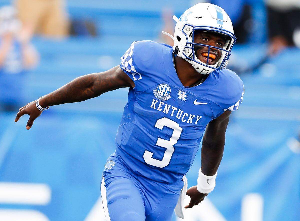 Kentucky quarterback Terry Wilson (3) was 14-of-18 for 151 yards and rushed for 129 yards and three touchdowns, but the Wildcats’ defense was porous against Ole Miss in a loss.