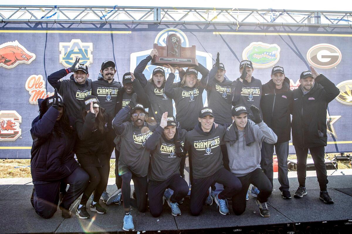 Members of the Ole Miss cross country team celebrated their championship at the Kentucky Horse Park on Friday.