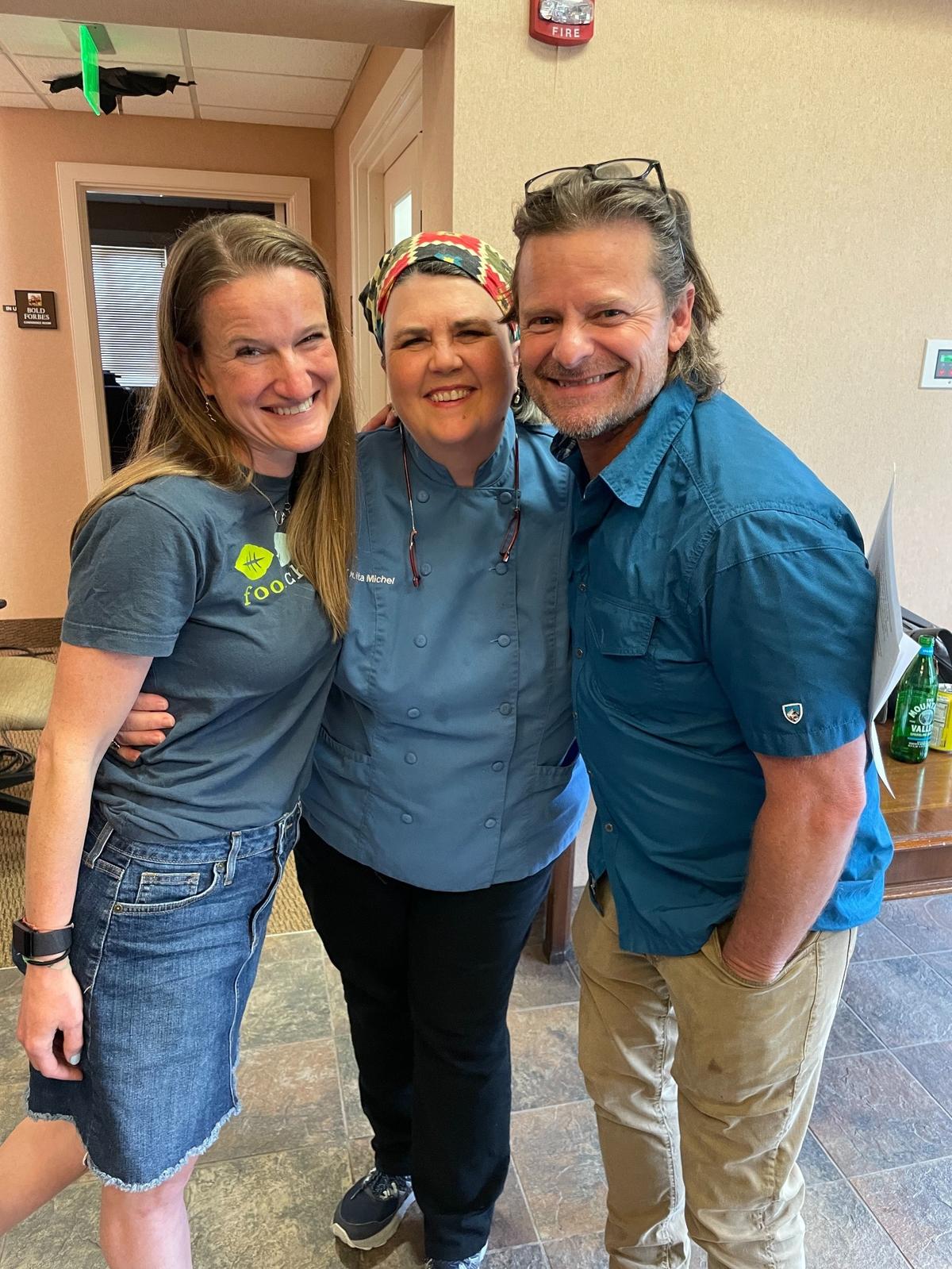 Chef Ouita Michel, with FoodChain founder Becca Self, left, and filmmaker and actor Steve Zahn, on the set of “You Belong Here.”