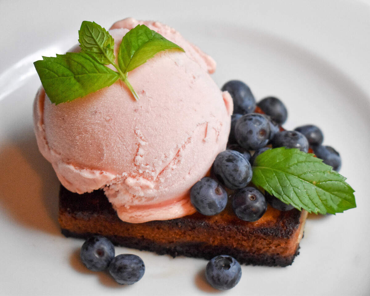 Toasted lemon pound cake with lemon glaze, Selma’s peach ice and fresh blueberries and mint leaves.
