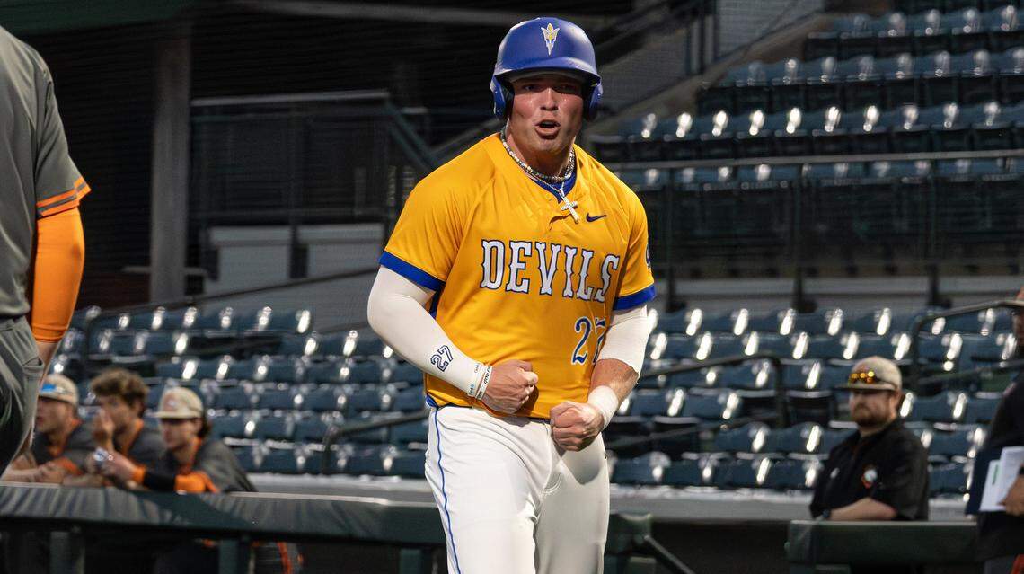 Henry Clay's Blake Miniard celebrates crossing home plate during Henry Clay's game against Frederick Douglass at Legends Field on April 15, 2026, in Lexington, Ky.