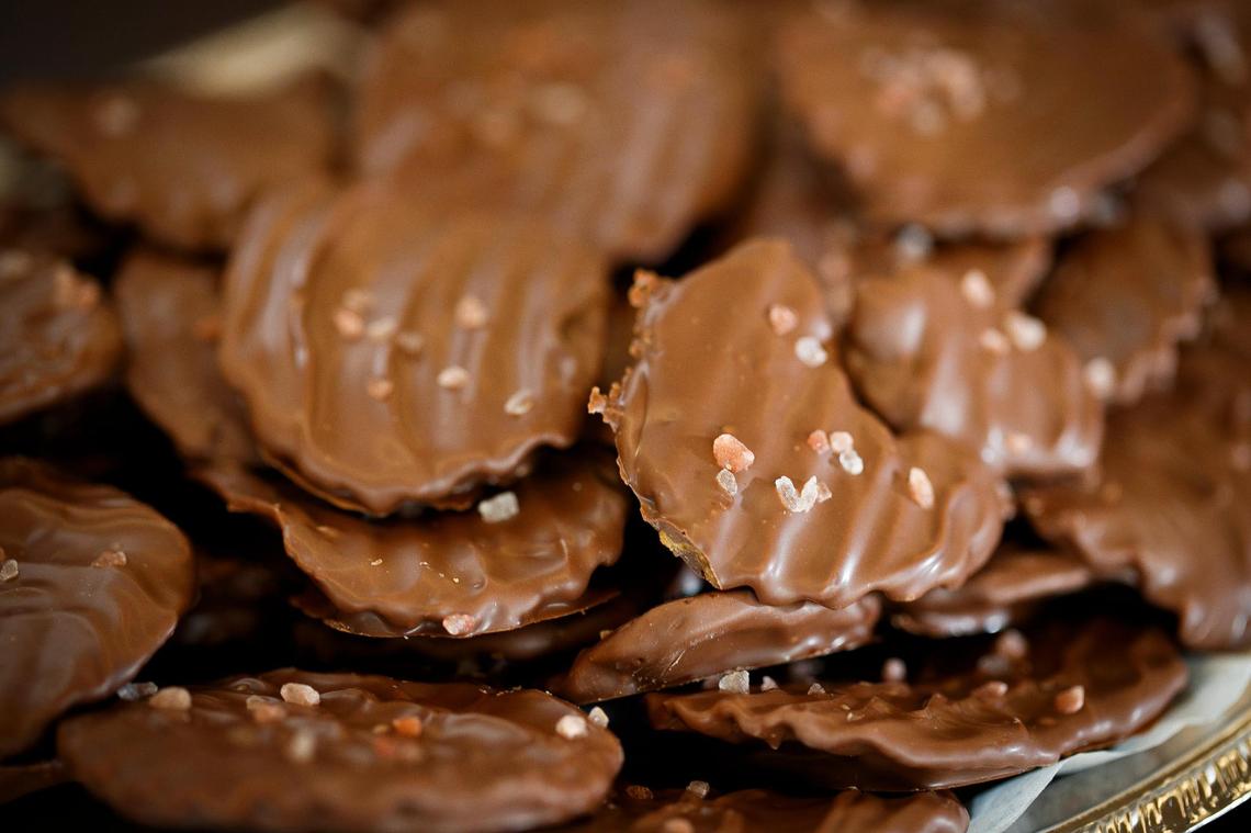 Chocolate-covered potato chips sprinkled with sea salt at Old Kentucky Chocolates in Lexington, Ky., Thursday, March 18, 2021.
