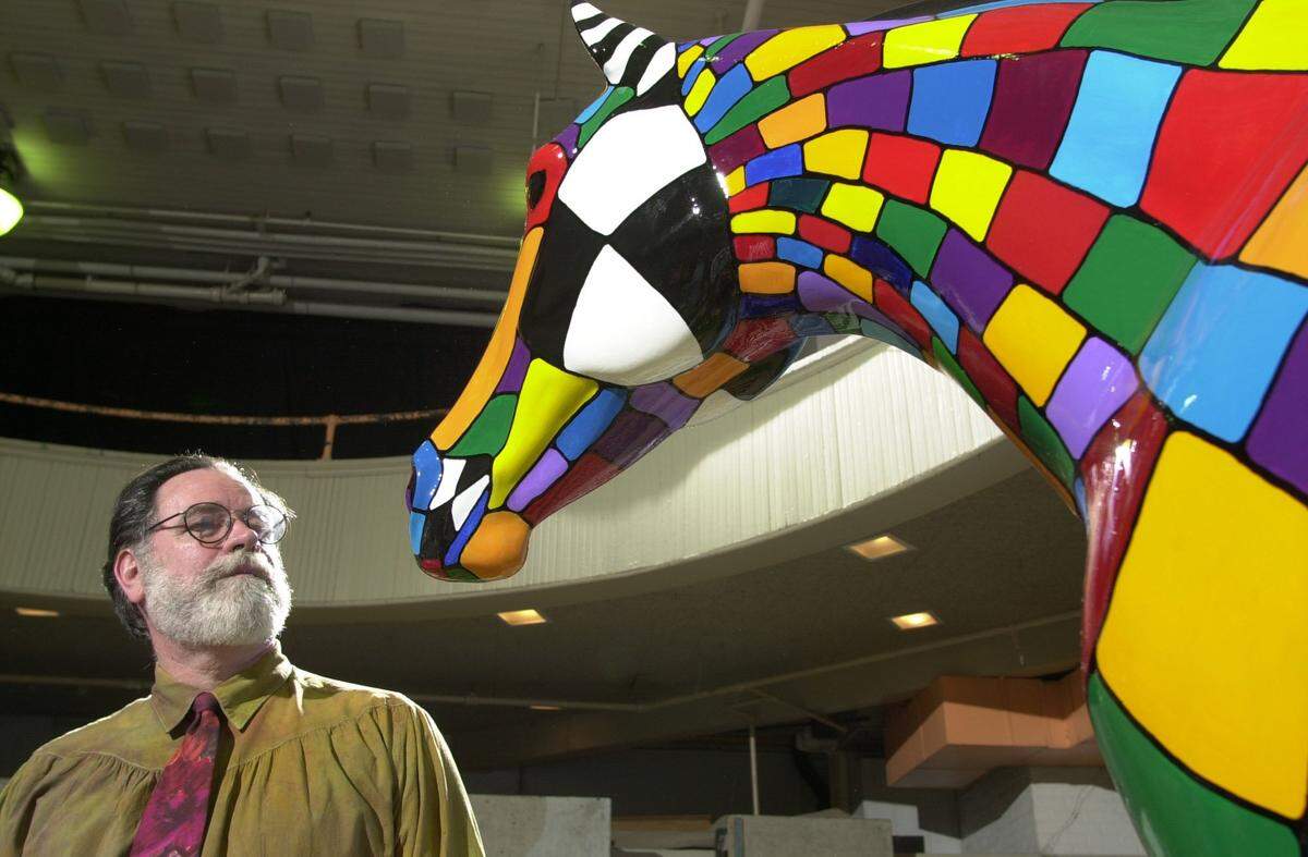 Artist Carleton Wing stood next to a fiberglass horse he painted for the 2000 Lexington art project, Horse Mania.
