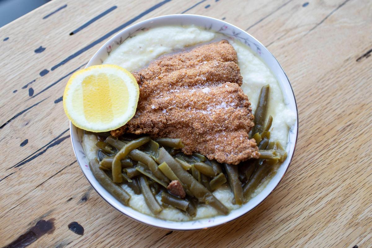 Solidago chef Jon Baugh often uses grits on entrees, like this catfish and grits.