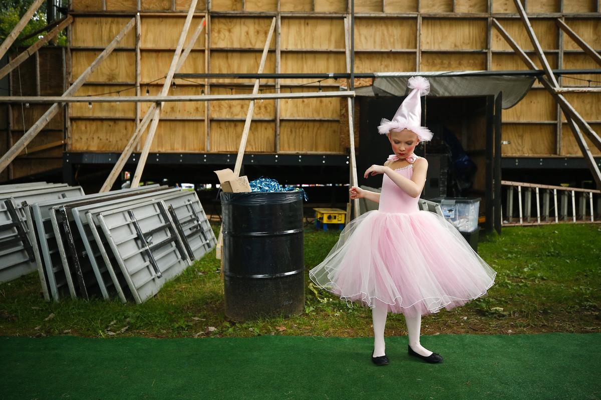 Delanee Potts, 8, of Lexington, warmed up for her performance as a member of the Lullaby League in the Ballet Under the Stars pre-show performance of The Wizard of Oz Thursday at Woodland Park in Lexington. Ballet Under the Stars runs through Aug. 5 at Woodland Park, the youth begins at 8 p.m. and the main show begins at 9 p.m. Tickets are $6 a person and free for children under the age of 3.