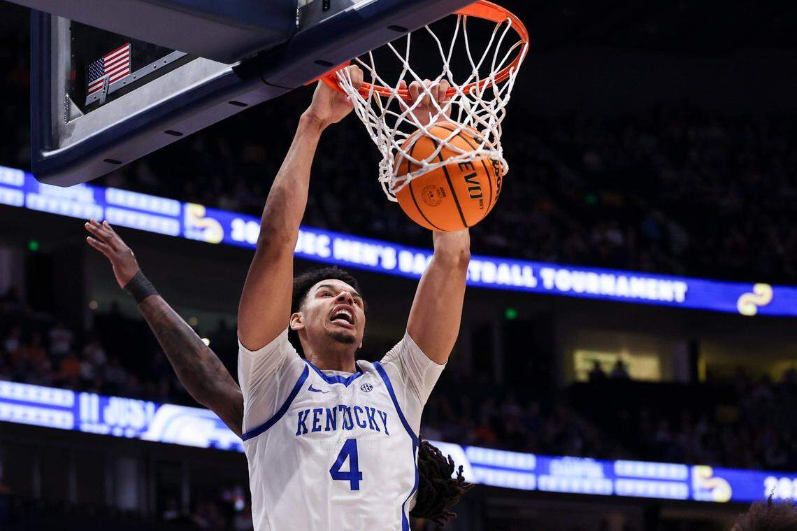 Kentucky forward Tre Mitchell dunks against Texas AM during the SEC Tournament quarterfinals at Bridgestone Arena in Nashville.