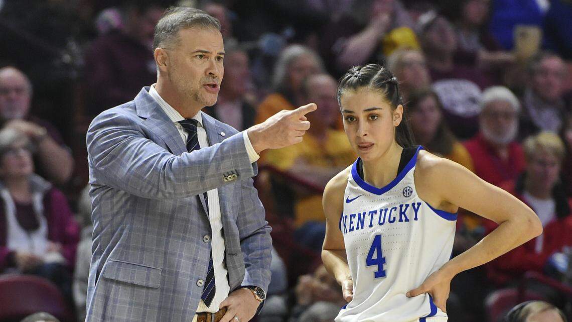 Kentucky head coach Matthew Mitchell consulted with Maci Morris during the first half on Friday.