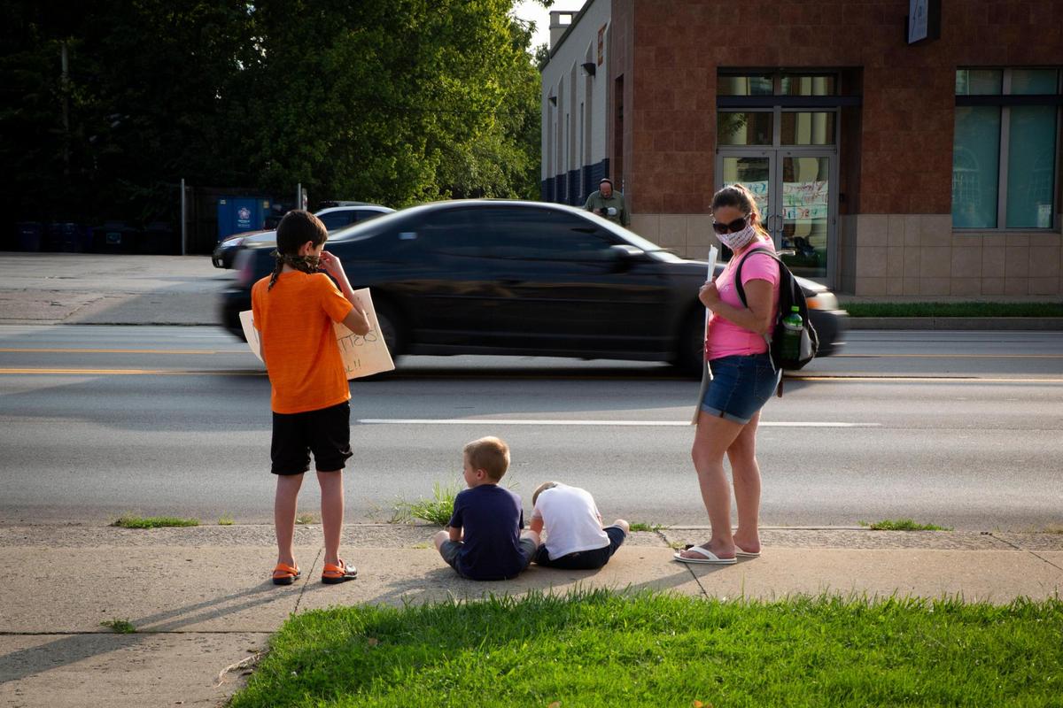 Students and parents participate in the Let Them Learn rally and protest outside the Fayette County Public Schools central office in Lexington, Ky, on Monday, September 14, 2020.