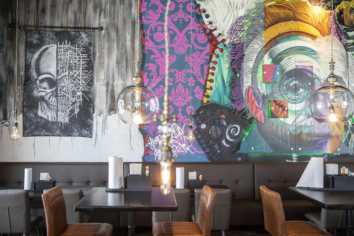 The new Agave & Rye at Fayette Mall features murals on the wall and art created for the restaurant.