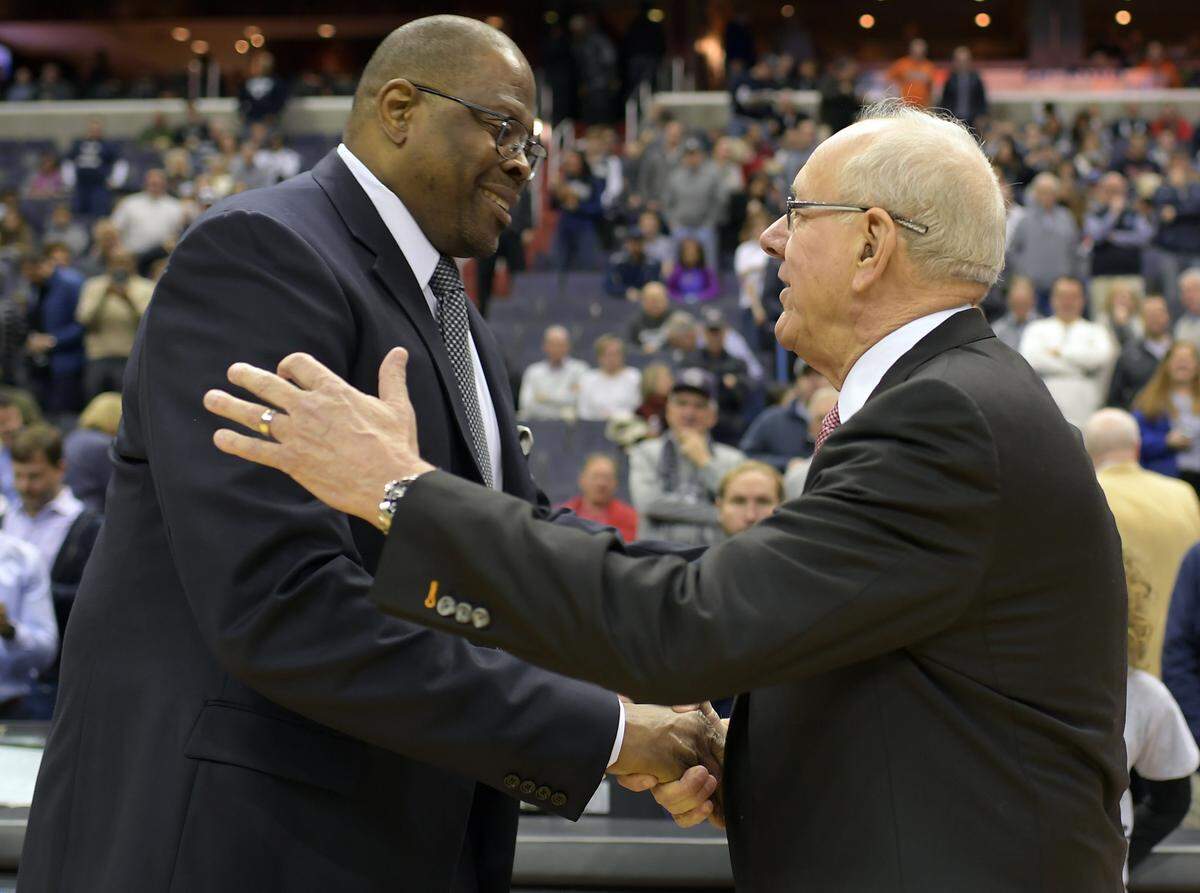 Georgetown Coach Patrick Ewing, left, greeted Syracuse Coach Jim Boeheim before a game. In two seasons as Hoyas head man, Ewing is 34-29.
