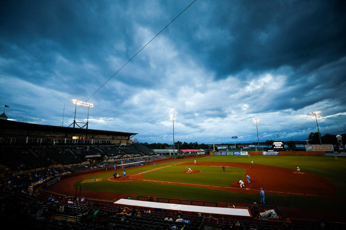 Storm clouds mover over the field as the Lexington Legends take on the Florence Y’alls during their Battle of the Bourbon Trail game at Whitaker Bank Ballpark in Lexington, Ky., Saturday, Aug. 1, 2020. Lexington beat Florence 4-3.