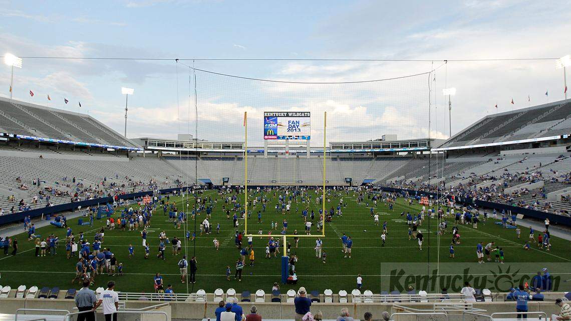 Fans were allowed on the field before practice during UK Football Fan Day at Commonwealth Stadium in Lexington, Ky., on Aug. 9, 2013.  by Photo by Pablo Alcala | Staff 