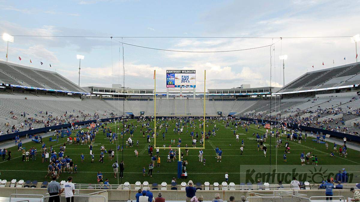 Fans were allowed on the field before practice during UK Football Fan Day at Commonwealth Stadium in Lexington, Ky., on Aug. 9, 2013.  by Photo by Pablo Alcala | Staff 