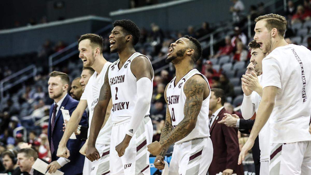 Eastern Kentucky’s bench erupts during the Colonels’ victory over Tennessee State in the 2021 Ohio Valley Conference Tournament in Evansville, Ind. On Thursday, EKU, a founding member of the OVC, will officially become a member of the ASUN Conference.