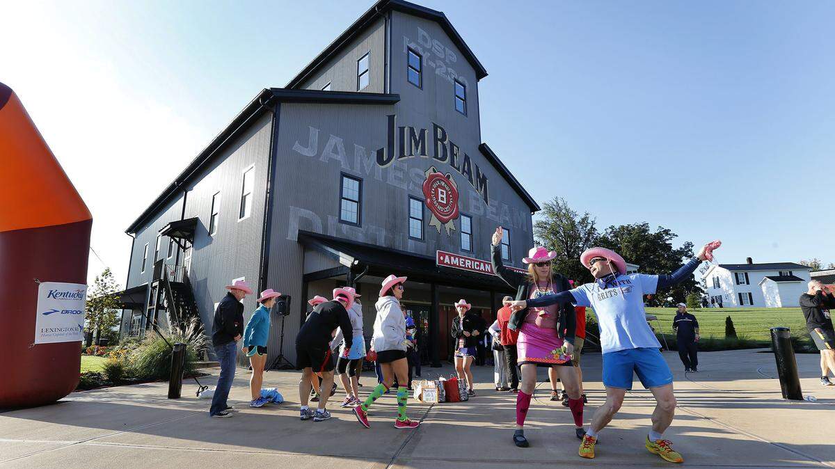 Caroline Duley and David Miller danced at the Jim Beam American Stillhouse in Clermont early Friday before the start of the Bourbon Chase, a 200-mile overnight relay along the Kentucky Bourbon Trail. Thousands come for the race and go home with memories and bourbon.