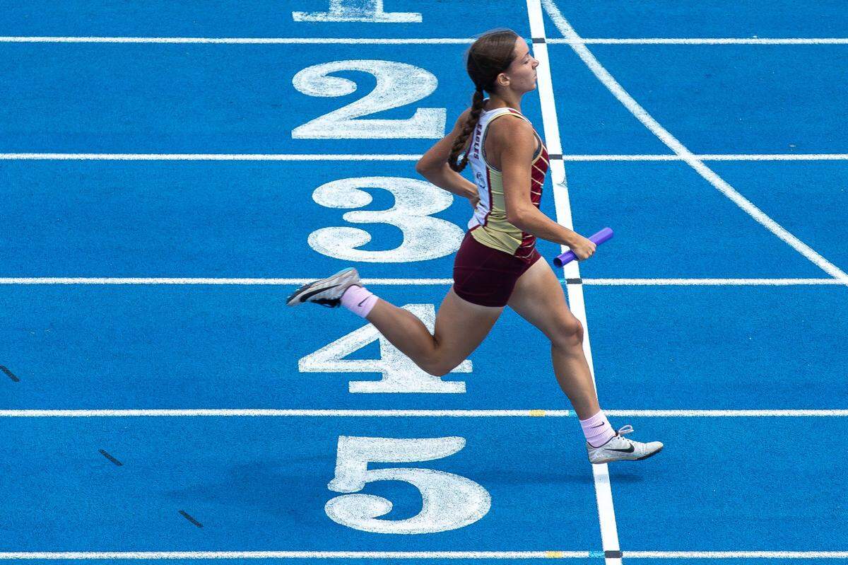 Leslie County’s Haylie Smith crosses the finish line first during the girls 4-by-100 relay at the Class A outdoor state track and field meet Thursday.
