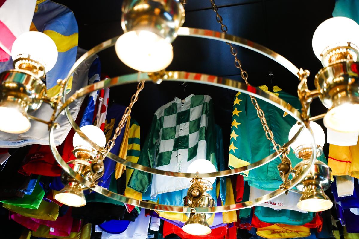 Racing silks hang from the ceiling at the new Jeff Ruby’s Steakhouse at City Center in downtown Lexington.
