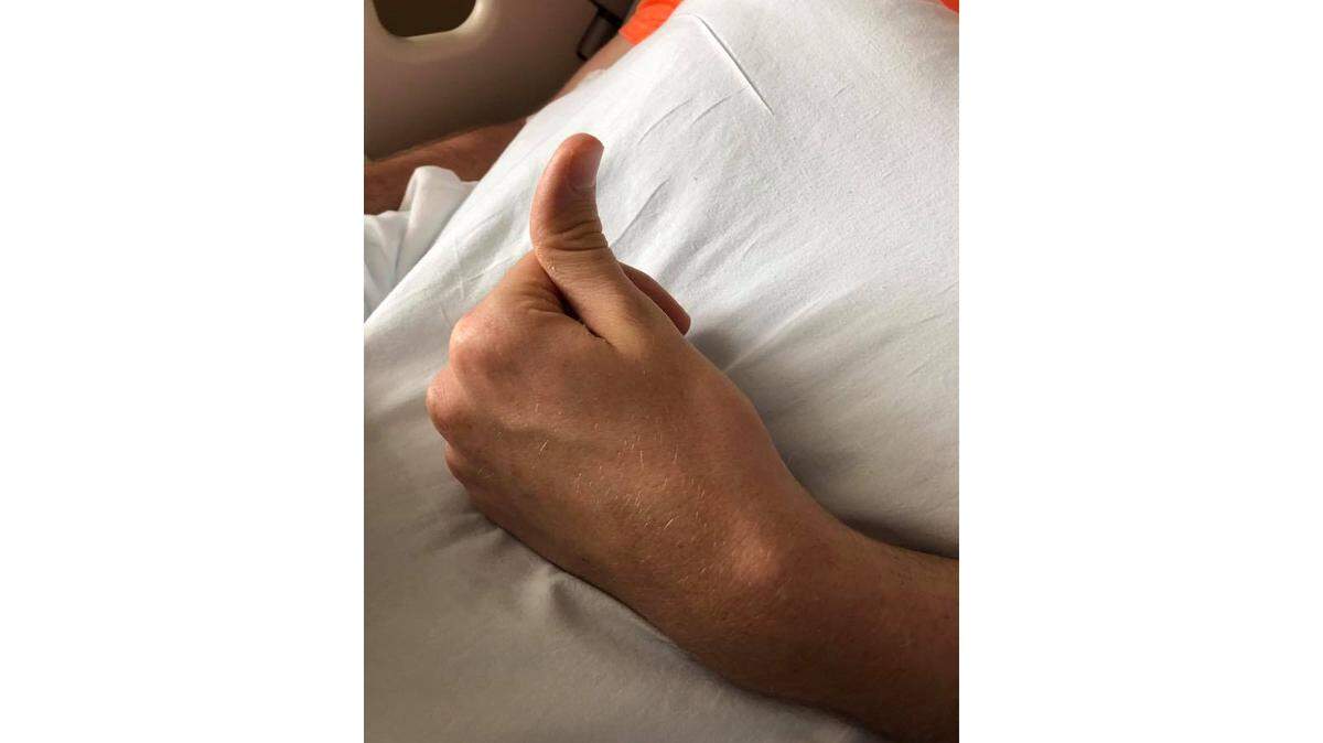 Corbin Harris, who fell from a Lexington apartment balcony in late August, gave a thumbs up sign Tuesday.