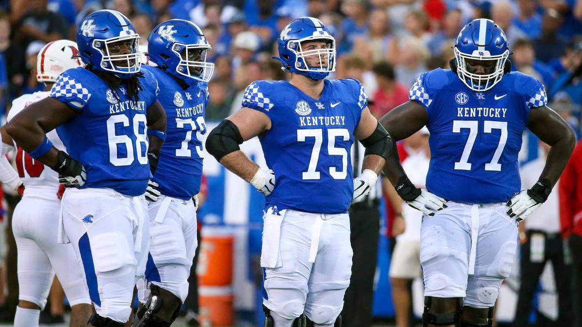From left, Kentucky’s Kenneth Horsey (68), Tashawn Manning (79), Eli Cox (75) and Jeremy Flax (77) have been major contributors up front in the Wildcats’ new-look offensive line.