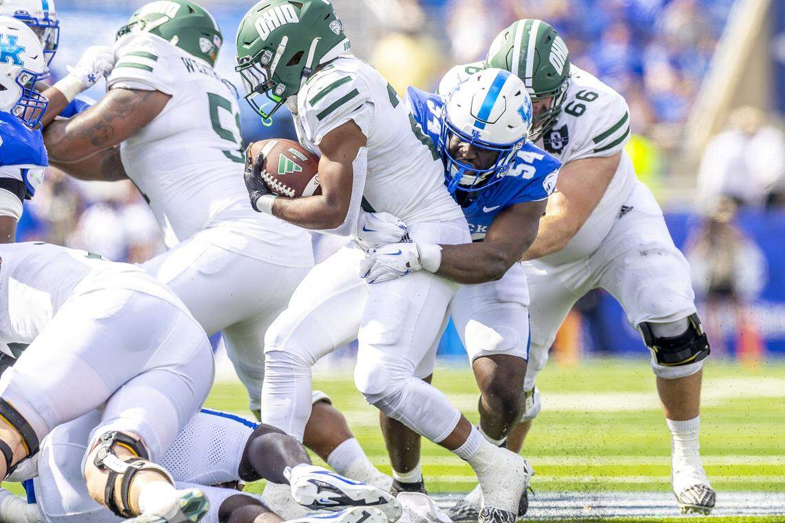 Kentucky linebacker D’Eryk Jackson (54) tackled Ohio running back Rickey Hunt Jr. (28) during UK’s 41-6 win over the Bobcats last week. Jackson tied for Kentucky’s team lead with four tackles in the game.