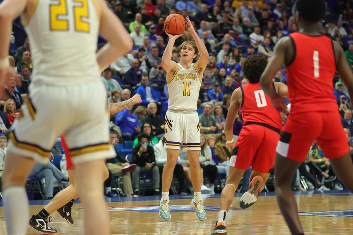Lyon County point guard Travis Perry made four of his nine three-point attempts during Thursday’s win in Rupp Arena.