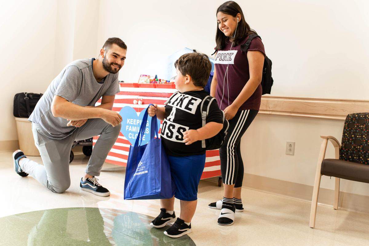 Isaac Humphries visited with families at the Pediatric Specialty Clinic within the Kentucky Clinic.