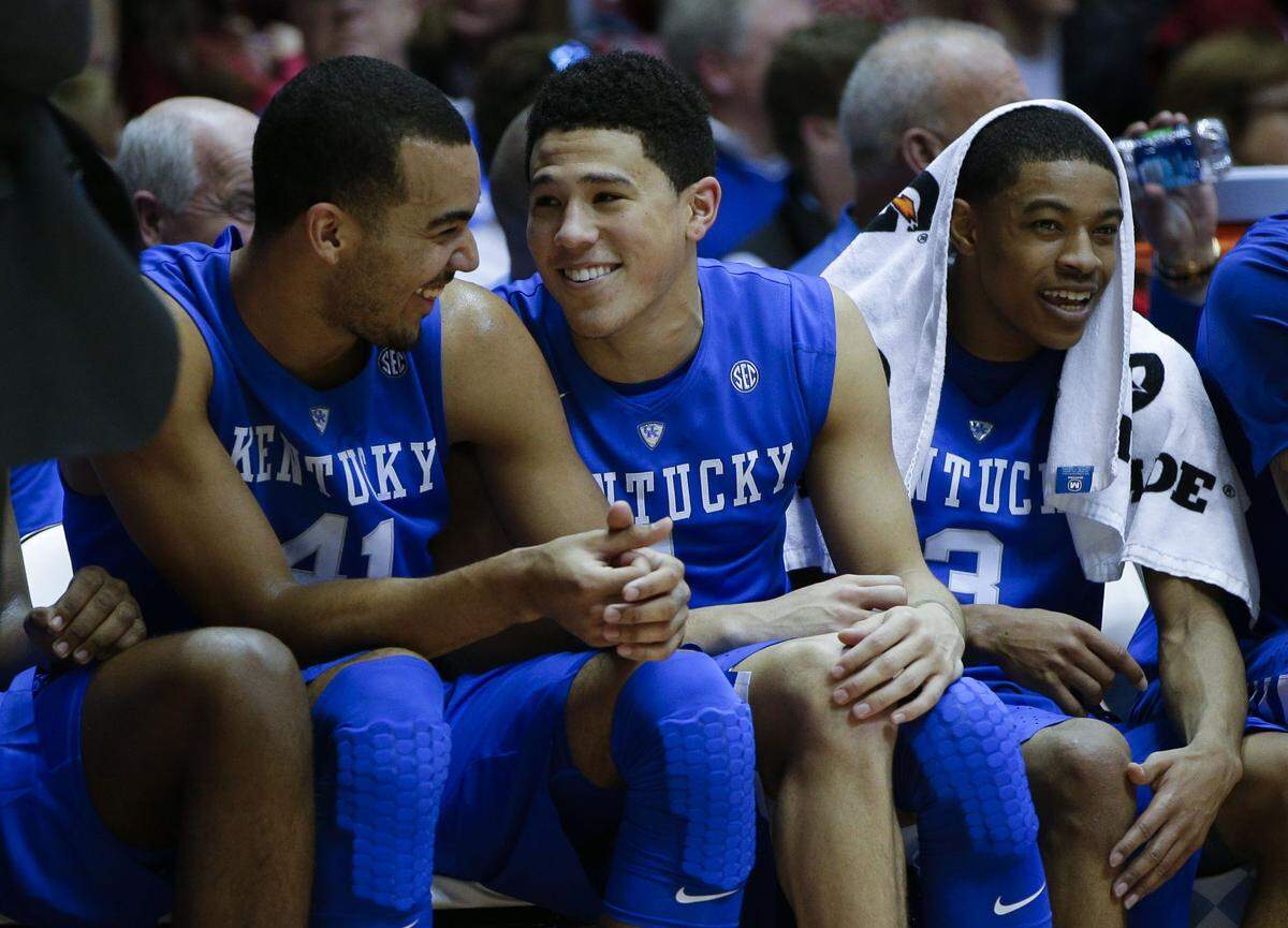 Devin Booker, middle, missed his first five three-point attempts and 10 of his first 11 as a Wildcat in 2014-15. He finished his one season at Kentucky making 58 of 141 from three-point range for 41.1 percent. Booker is now one of the NBA’s most accomplished young scorers, averaging 24.4 points per game this season for the Phoenix Suns.